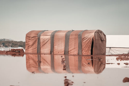 There is a tarp over a body of water