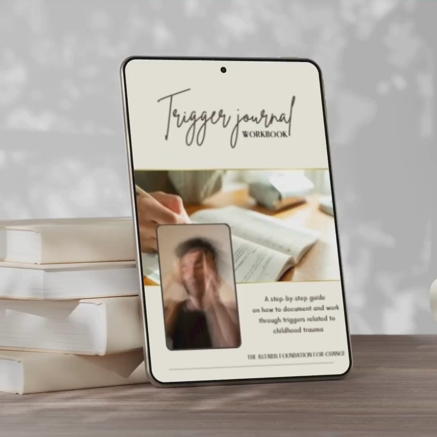 front page from our trigger journal workbook. this workbook contains a step by step guide on how to document and work through triggers related to childhood trauma.